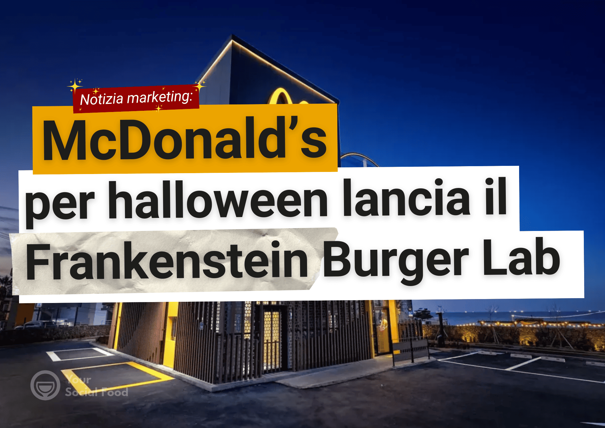 Ristorante McDonald’s illuminato di notte per il lancio del Frankenstein Burger Lab, campagna di Halloween 2024.